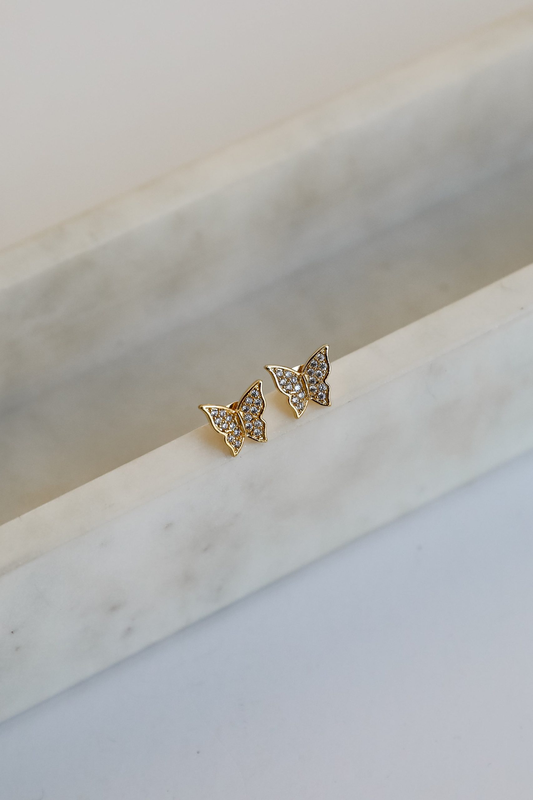 shopdressup_gold_butterfly_stud_earrings_ab551478-3726-4f6d-9be8-e4ca609be3b6.jpg